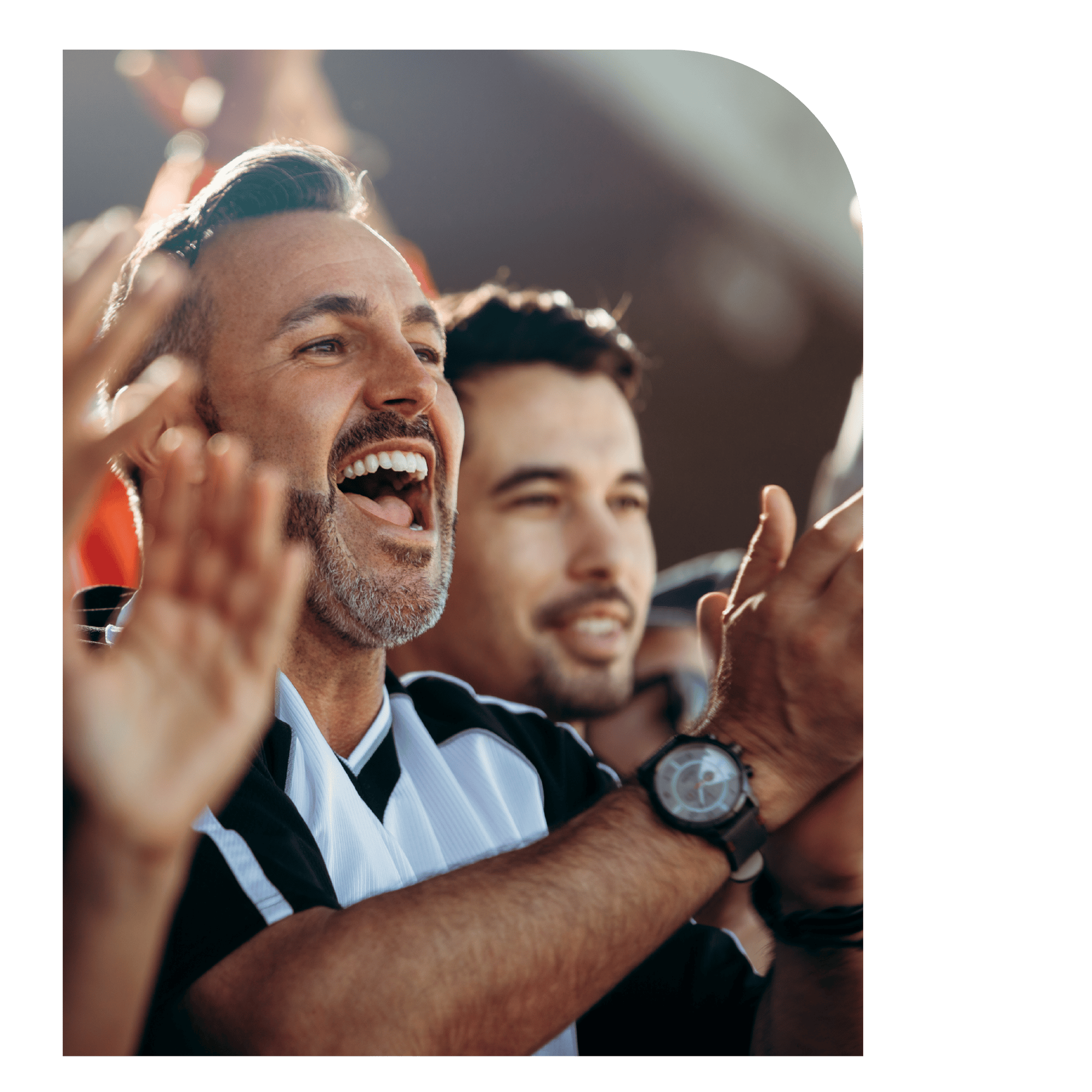 Spectators clapping at a racing event